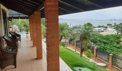 Casa com 3 dormitórios à venda, 165 m² por R$ 1.016.000,00 - Praia de São Miguel - Penha/SC