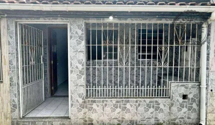 Casa na Guilhermina em Praia Grande/SP.