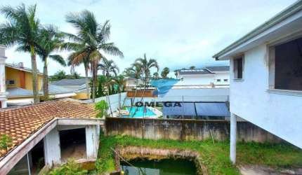 Casa à venda no Acapulco no Guarujá | Omega Imóveis