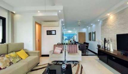Apartamento reformado com varanda e 3 dormitórios à venda na praia das Pitangueiras - Guarujá/SP
