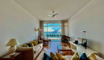 Apartamento frente mar à venda na praia das Pitangueiras no Guarujá I Omega Imoveis