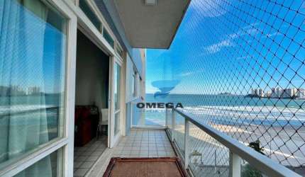 Apartamento vista mar à venda na praia das Pitangueiras no Guarujá I Omega Imoveis