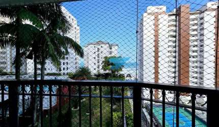 Apartamento à venda na quadra da praia das Pitangueiras no Guarujá I Omega Imoveis