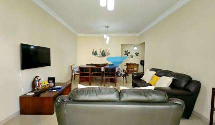 Apartamento reformado à venda na praia das Pitangueiras no Guarujá I Omega Imoveis