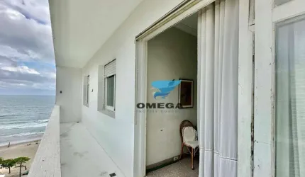 Apartamento reformado com vista mar à venda na Praia das Pitangueiras no Guarujá I Omega Imoveis