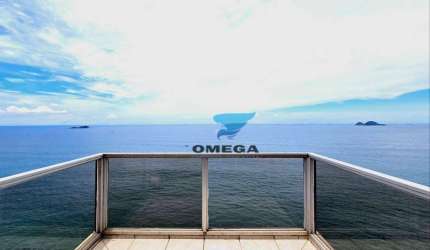Apartamento com vista mar à venda na praia das Pitangueiras no Guarujá I Omega Imoveis