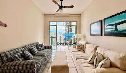 Apartamento com vista mar à venda na praia das Pitangueiras no Guarujá I Omega Imoveis