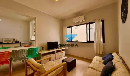 Apartamento reformado á venda na praia do Tombo no Guarujá I Omega Imoveis