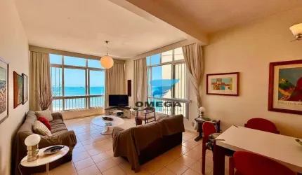 Apartamento frente mar á venda na praia das Pitangueiras no Guarujá I Omega Imoveis