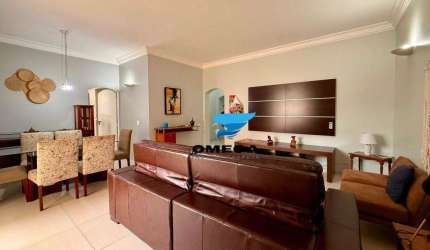 Apartamento reformado à venda na praia das Pitangueiras no Guarujá I Omega Imoveis