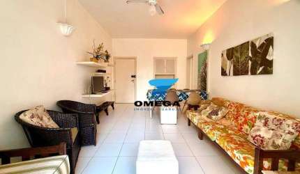 Apartamento vista mar à venda na praia das Pitangueiras no Guarujá I Omega Imoveis