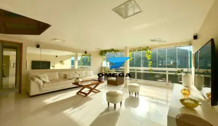 Apartamento beira mar à venda na praia das Pitangueiras no Guarujá I Omega Imoveis