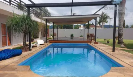 Casa à Venda no Condomínio Jardim Acapulco no Guarujá | Omega Imóveis