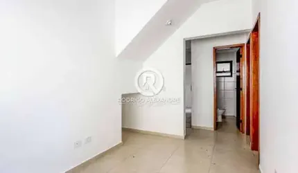 Casa Geminada à Venda em Tupi, Praia Grande - 2 Dormitórios, Quintal e Área de Lazer!