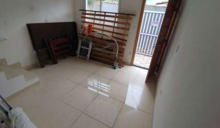 Casa 2 quartos - Quintal - Lado Praia no Jardim Real em Praia Grande - RP439