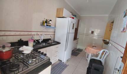 Vila Caiçara, casa 2 dorms suite, quintal e garagem.