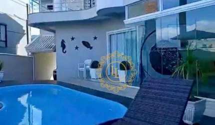 casa com 3 suítes 04 vagas  à venda, 304 m²