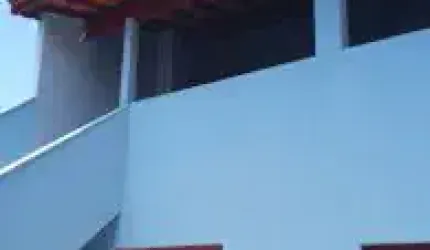 Casa no bairro Jardim São João, em Itanhaém - sendo lado praia, em rua calçada.