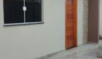 Casa no bairro Nova Itanhaém, em Itanhaém - sendo lado serra, em rua calçada.