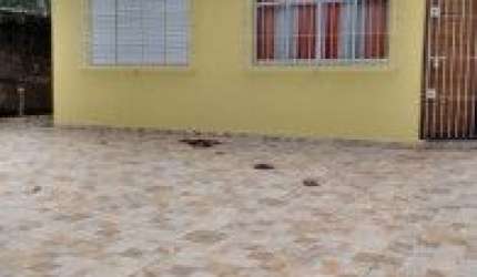 Casa no bairro Jardim das Palmeiras, em Itanhaém - sendo lado praia, em rua calçada.