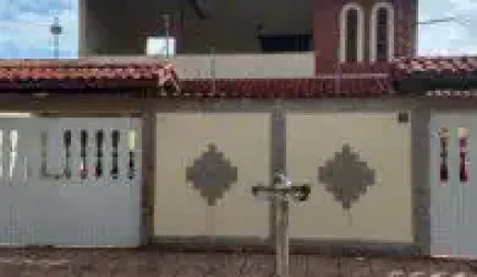 Casa no bairro Jardim Jamaica, em Itanhaém - sendo lado praia, em rua calçada.