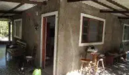 Chácara no bairro Parque Real, em Itanhaém - sendo lado serra, em rua de terra.