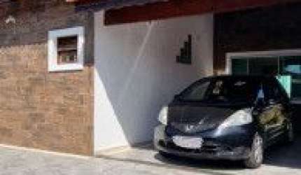 Casa no bairro Jardim Califórnia, em Itanhaém - sendo lado praia, em rua calçada.