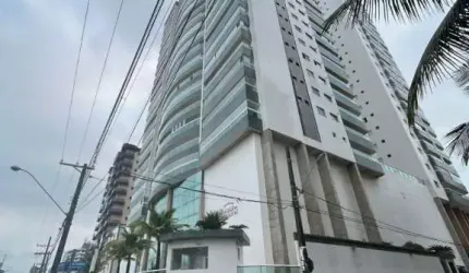 Apartamento com 3 suítes em frente a praia do caiçara com sacada gourmet vista mar definitiva.