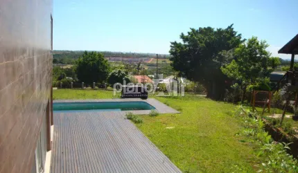 Casa de 400,00m² com 04 suítes no Condomínio Paragem dos Verdes Campos em Gravataí - RS