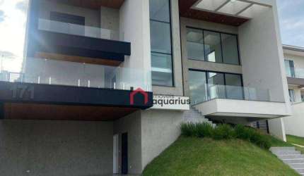 Sobrado com 4 dormitórios à venda, 440 m² por R$ 4.900.000,00 - Condomínio Reserva do Paratehy - São José dos Campos/SP