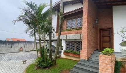 Casa com 4 dormitórios para alugar, 329 m² por R$ 16.388,32/mês - Parque do Colégio - Suzano/SP