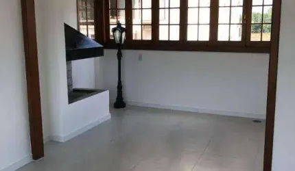 No bairro Rio Branco,2 dormitórios ,sacada e vaga