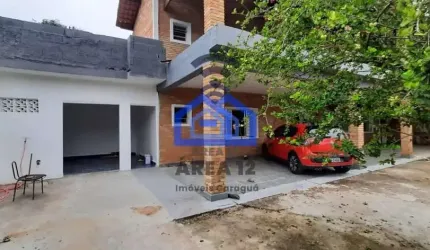 Sobrado à venda no Bairro Porto Novo - 5 suítes, 2 salas amplas, cozinha, 6 banheiros, garagem para