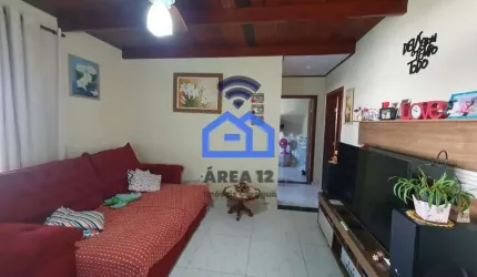 Casa à Venda no bairro Martim de Sá com 2 dormitórios, banheiro, sala ampla, cozinha e 5 vagas de g
