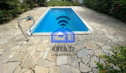Casa com piscina à venda na Martim de Sá, 3 dormitórios, sendo 1 suíte, sala com dois ambientes, co