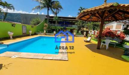 Casas à Venda no bairro Martim de Sá com 02 Dormitórios, Sala, Cozinha, Churrasqueira, Forno à lenh