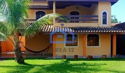 Sobrado à venda no bairro Pontal de Santa Marina em Caraguatatuba, com 2 dormitórios, 2 salas, 2 ba