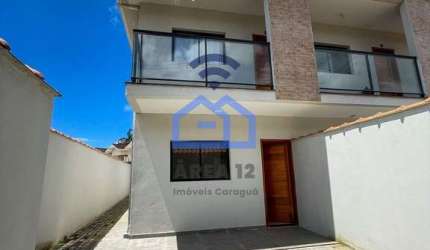 Casa à venda no bairro Martim de Sá em Caraguatatuba, SP - recém construída, ótima oportunidade de