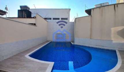 Casa ampla à Venda no bairro do Indaiá em Caraguatatuba, SP - com 3 dormitórios, sendo 1 suíte, áre