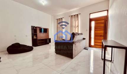 Casa à venda no bairro do Golfinho em Caraguatatuba, SP - 2 dormitórios, cozinha americana, garagem