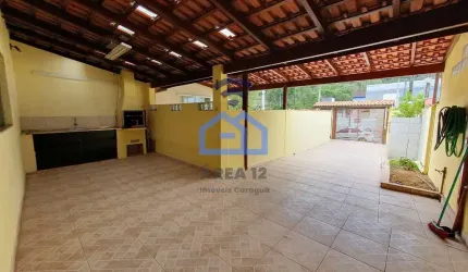 Sobrado à venda no bairro do Massaguaçu em Caraguatatuba, SP - com 219m², 4 dormitórios, sendo 1 su
