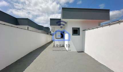 Casa à venda com 2 dormitórios, sendo uma suíte, ótimo acabamento, no bairro do Golfinho em Caragua