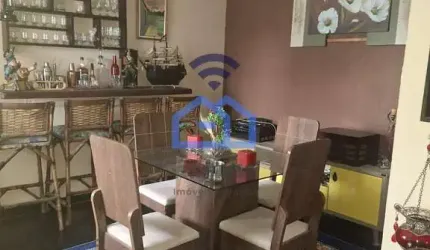 Casa ampla com quintal espaçoso à venda no bairro Pontal de Santa Marina em Caraguatatuba, SP