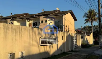 Sobrado em condomínio à venda no bairro Porto Novo em Caraguatatuba, SP - 69m², 2 suítes, lavanderi