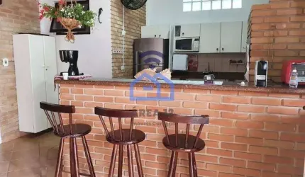 Sobrado com piscina e área gourmet à venda no bairro da Praia das Palmeiras em Caraguatatuba, SP