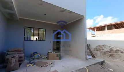 Sobrado geminado em construção à venda no bairro Massaguaçu em Caraguatatuba, SP com 02 suítes, 02