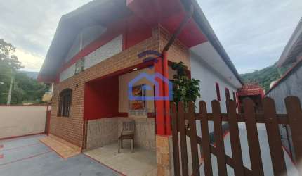 Casa térrea com edícula à venda no Portal Patrimônium, bairro do Massaguaçu em Caraguatatuba, SP