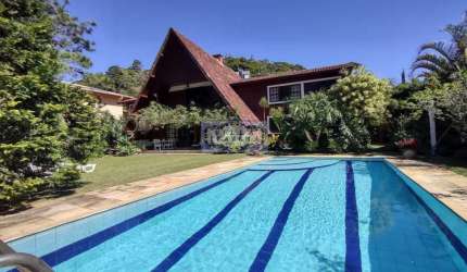 Casa em condomínio fechado com 7 quartos à venda na Avenida Spatodea, Carlos Guinle, Teresópolis, 272 m2 por R$ 2.500.000