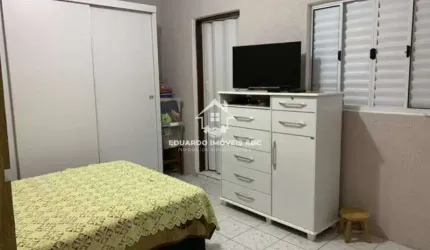 REF 3473. 2 casas. 4 dormitórios. 2 vagas na garagem. Vila Homero Thon - Santo André