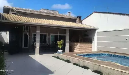 Casa com 3 dormitórios à venda, 190 m² por R$ 890.000 - Jardim Regina - Itanhaém/SP